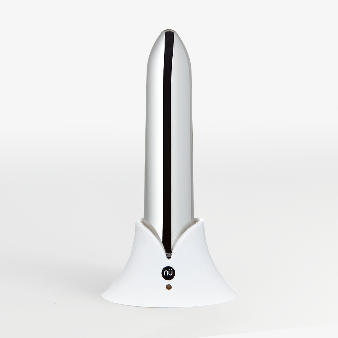 The nu sensuelle point 20 function bullet front with charger.